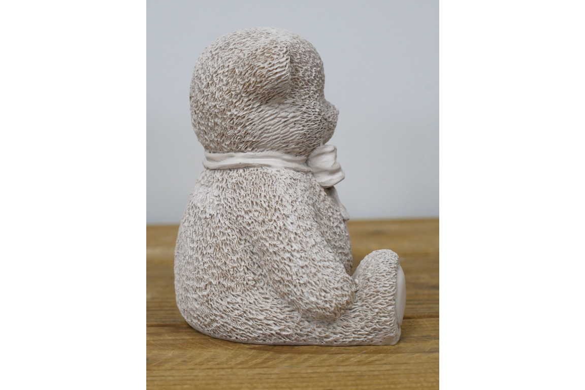 Cream teddy bear statue