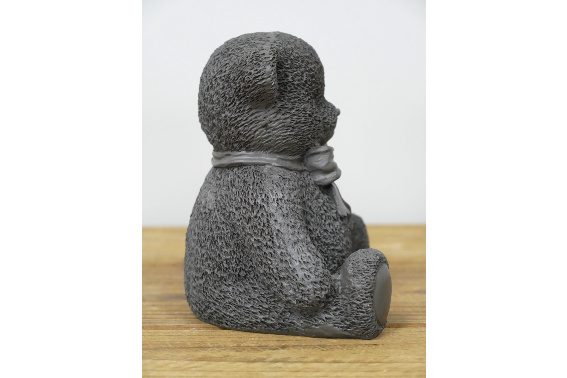 Grey teddy bear statue