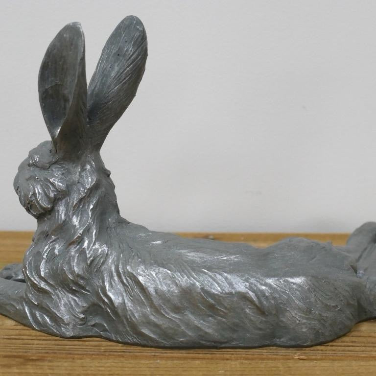 Small laying down hare for indoor or outdoor