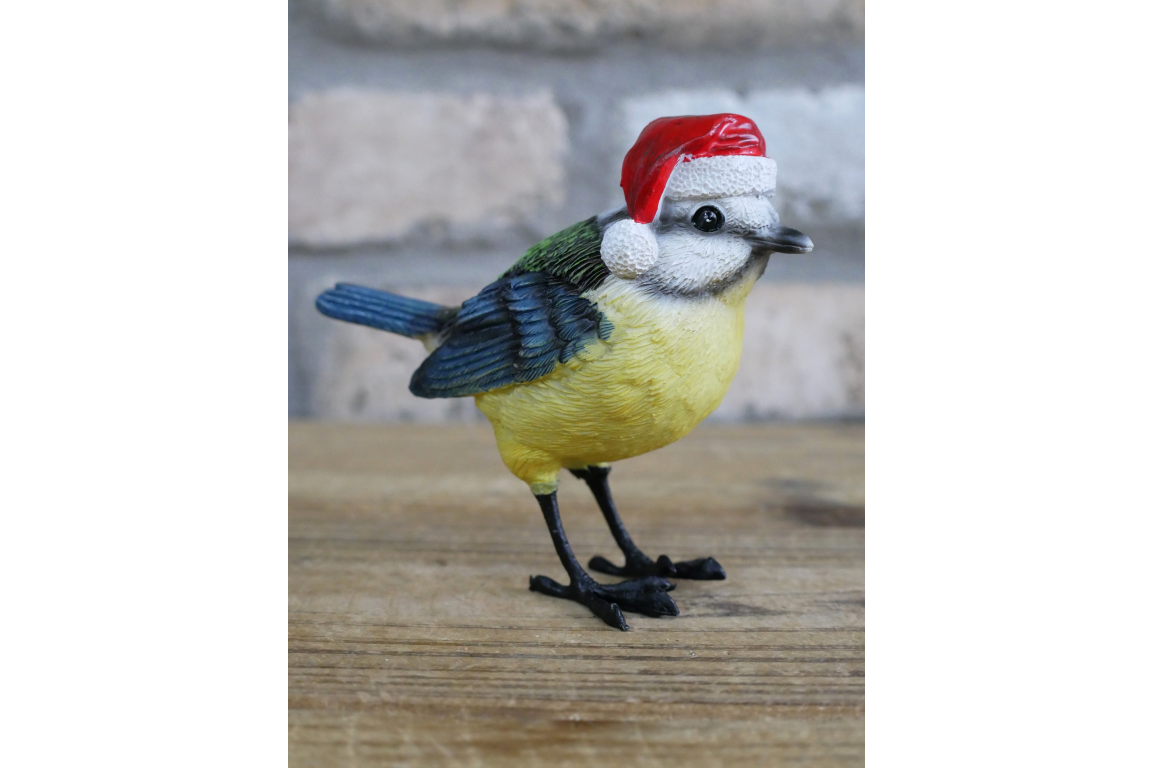 Christmas blue bird statue with Santa hat