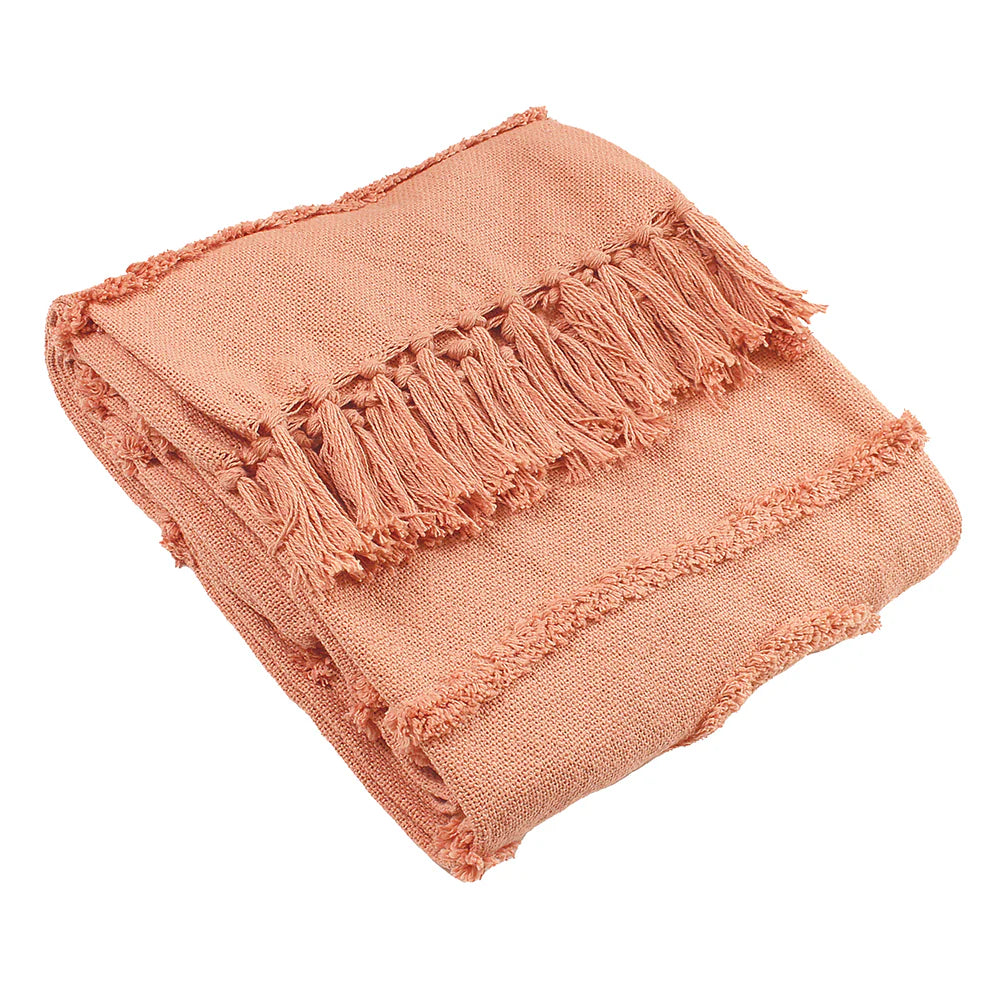 Textured throw in blush with Tassle detail