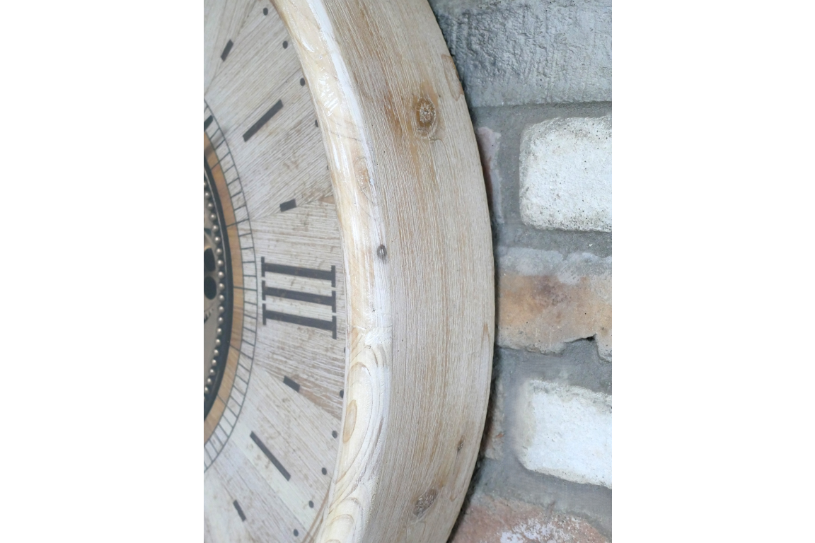 Large cream wall clock with moving brass cog detail