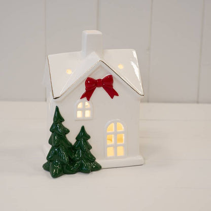 Large Christmas Home With Red Bow