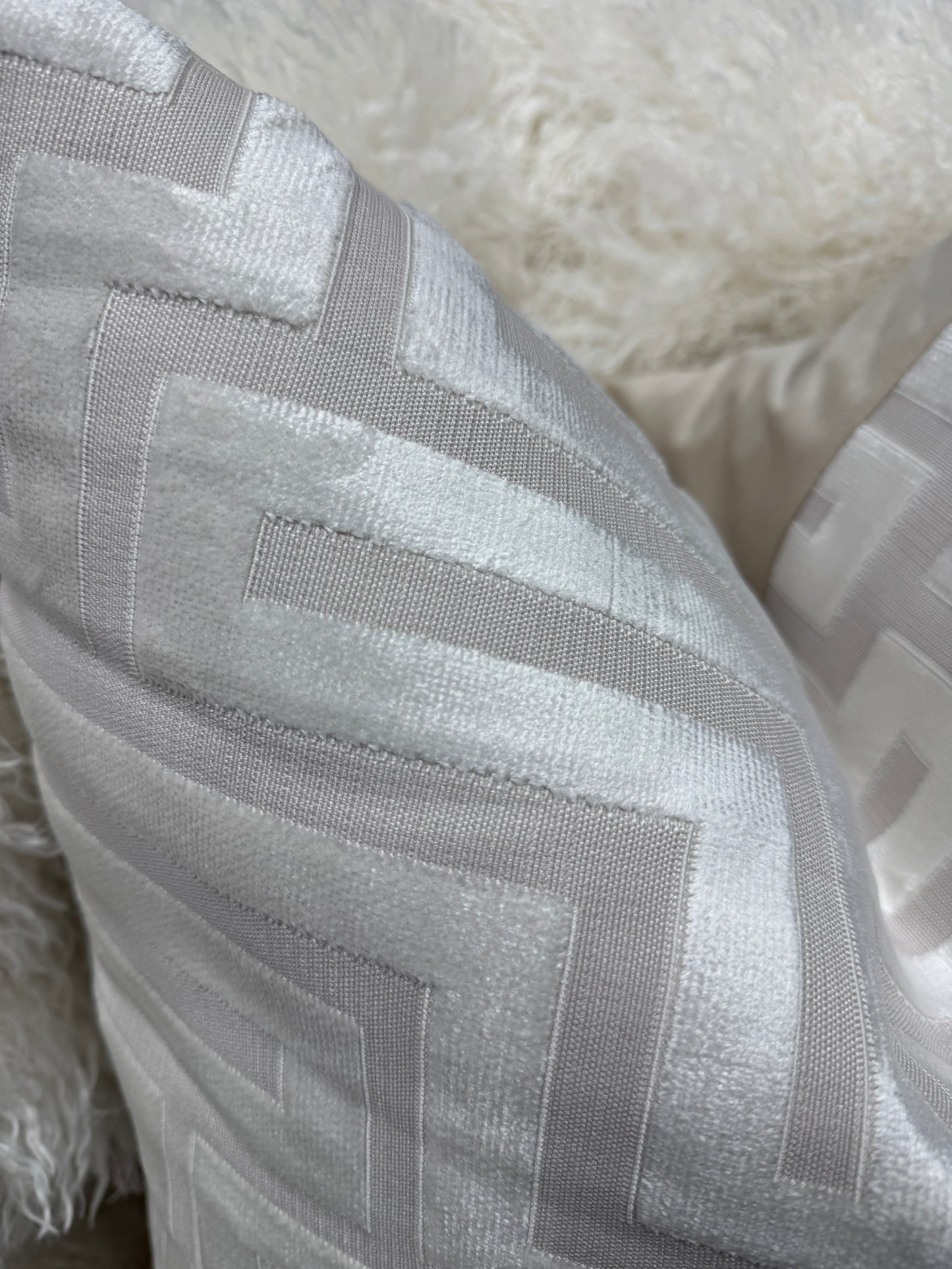 Cream Aztec velvet pattern cushion. 60 x 60cm feather filled