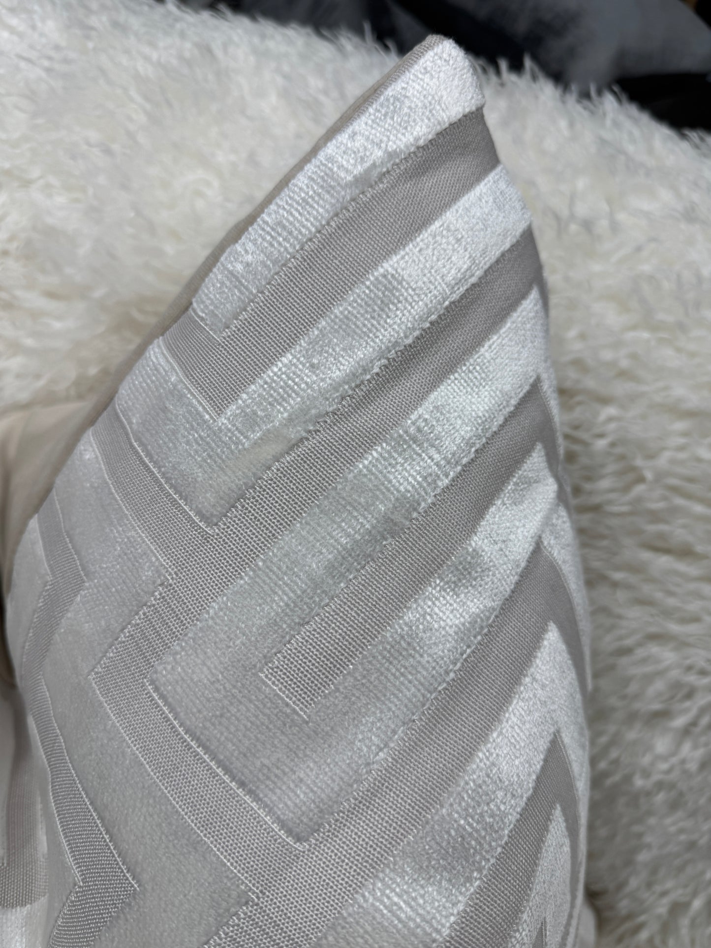 Cream Aztec velvet pattern cushion. 60 x 60cm feather filled