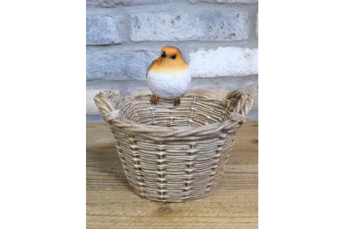 Robin on a basket garden statue