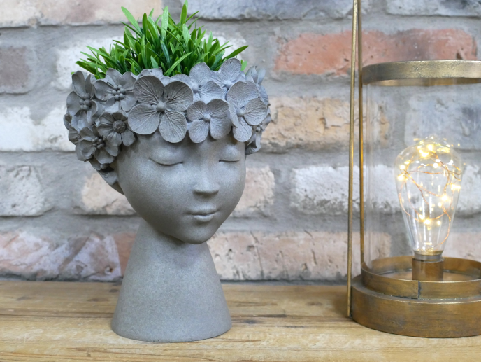 Grey flowered head planter . Beautiful face detail .