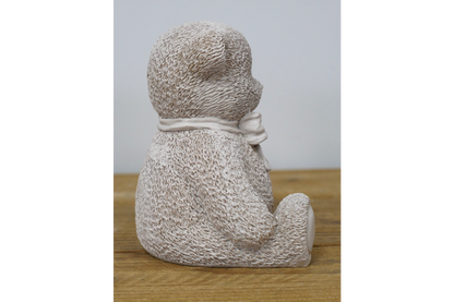 Cream teddy bear statue