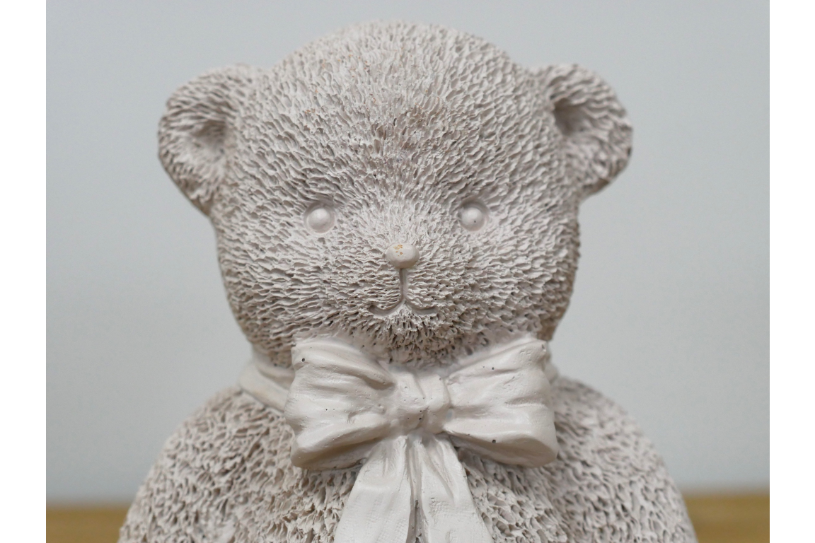 Cream teddy bear statue