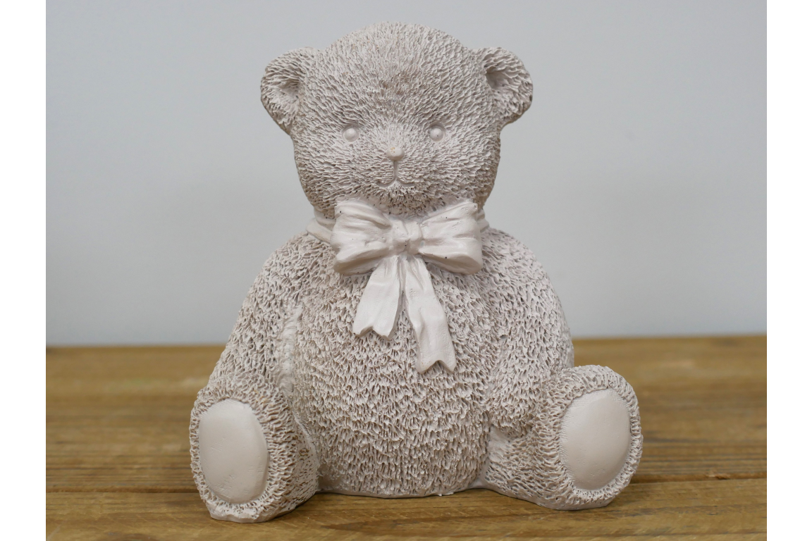 Cream teddy bear statue