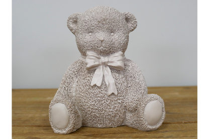Cream teddy bear statue