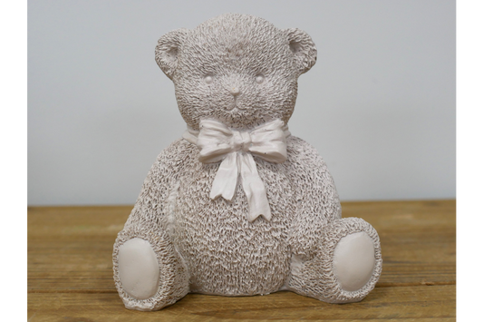 Cream teddy bear statue