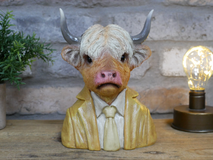 Highland cow bust in a suit statue