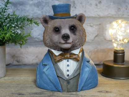 Bear bust in suit statue