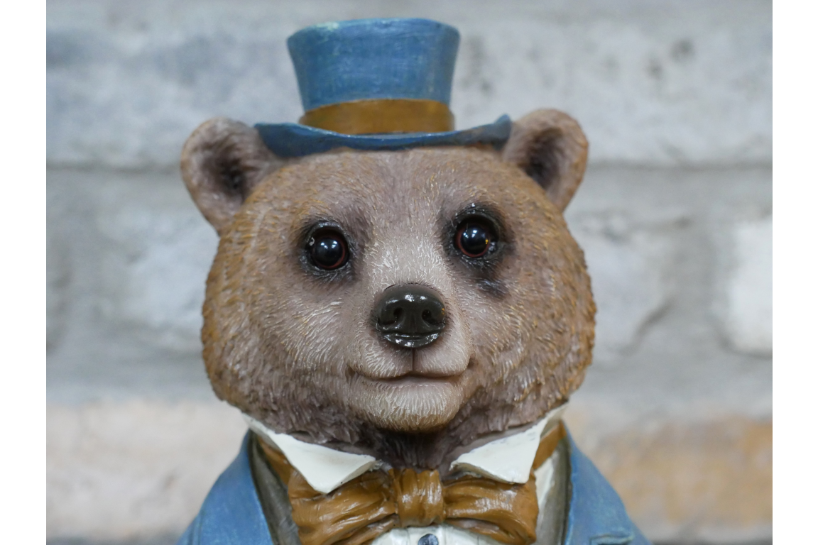 Bear bust in suit statue
