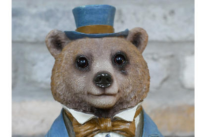 Bear bust in suit statue