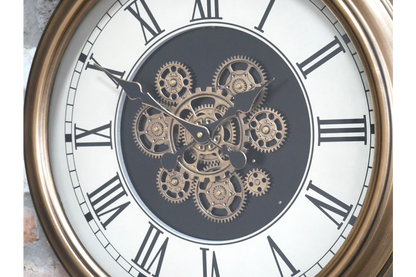 Soft gold cog moving wall clock