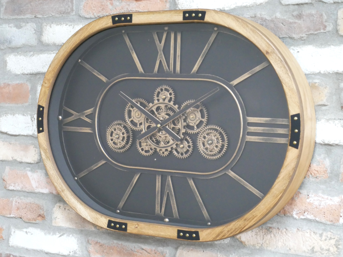 Moving cog clock wooden frame oval shape .