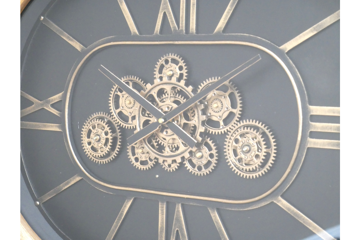 Moving cog clock wooden frame oval shape .
