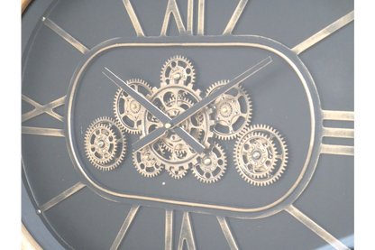 Moving cog clock wooden frame oval shape .