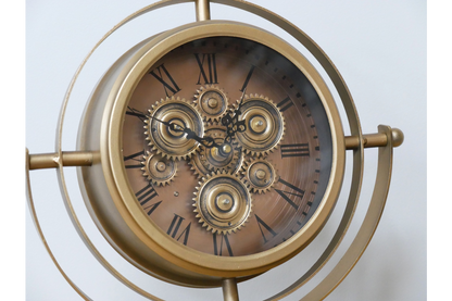 Gold mantle clock tripod legs with moving cog details