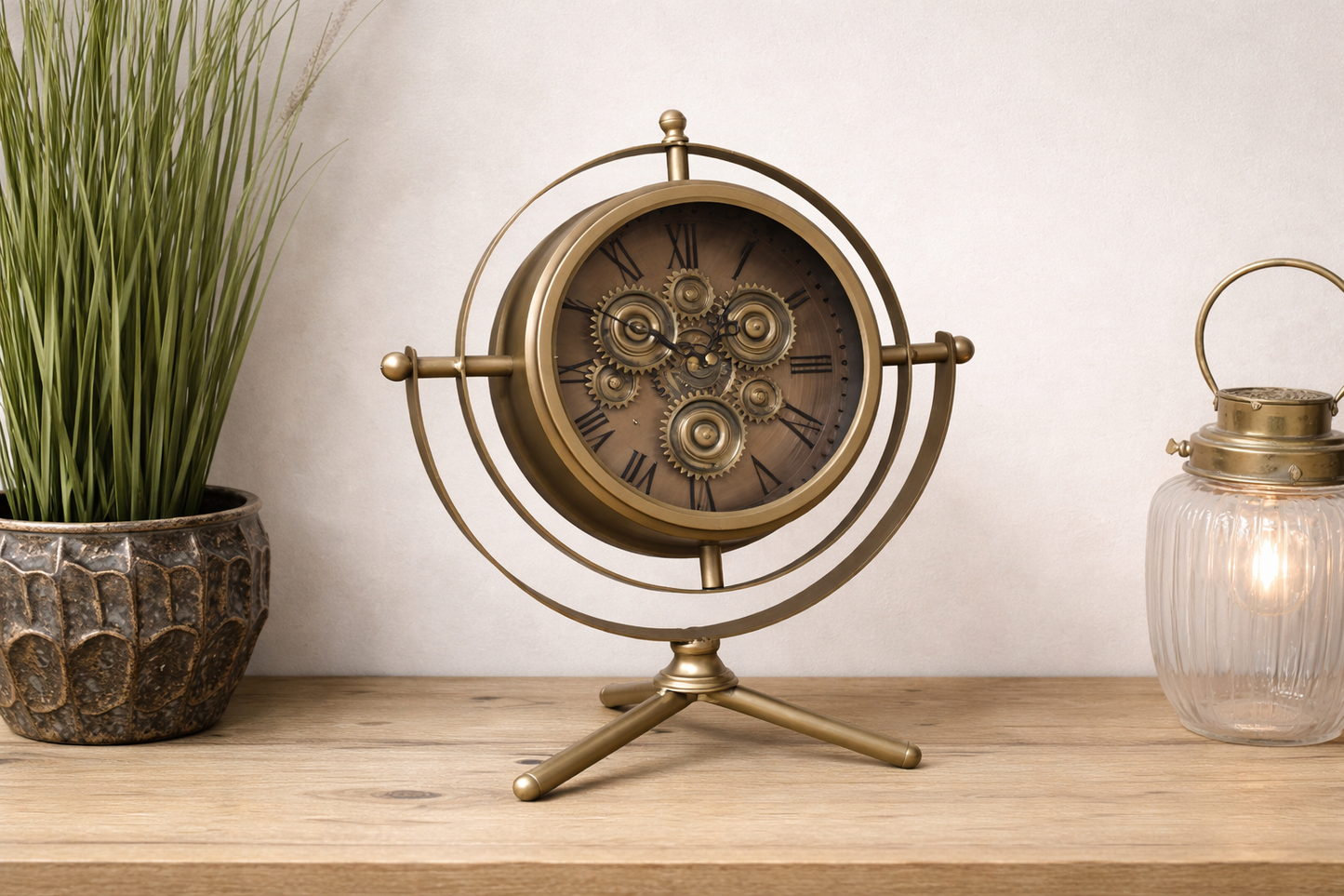 Gold mantle clock tripod legs with moving cog details