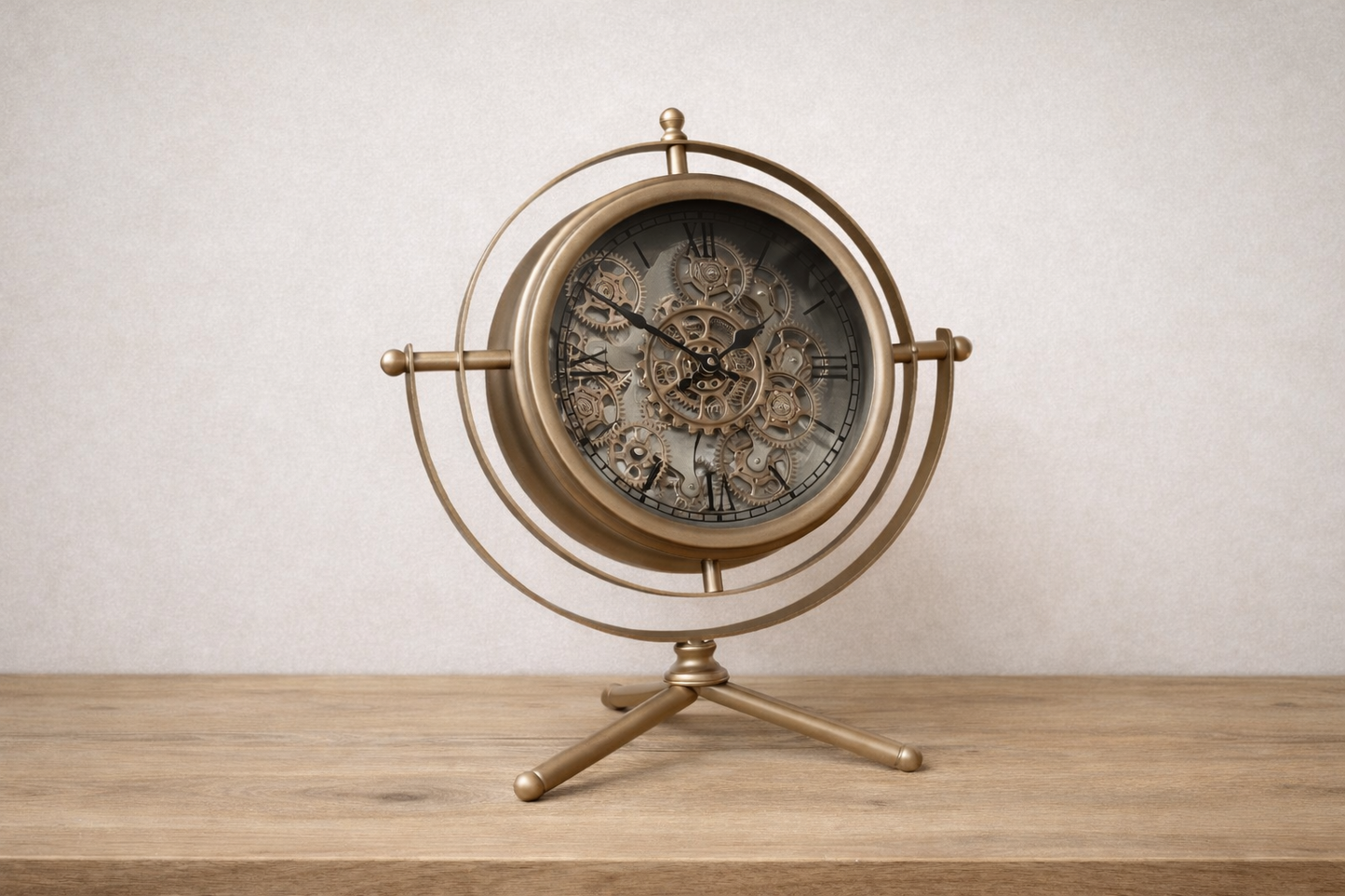 Large gold clock moving cog detail and tri pod design