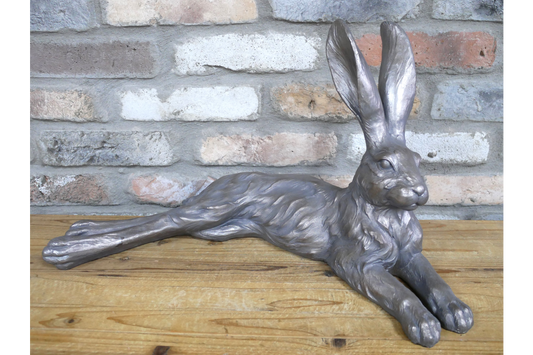 Large laying down hare  in grey , indoor or outdoor statue