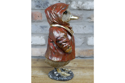 Duck in a red coat statue