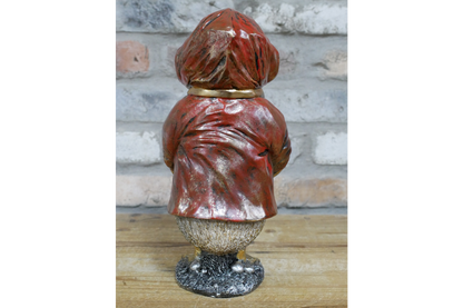 Duck in a red coat statue