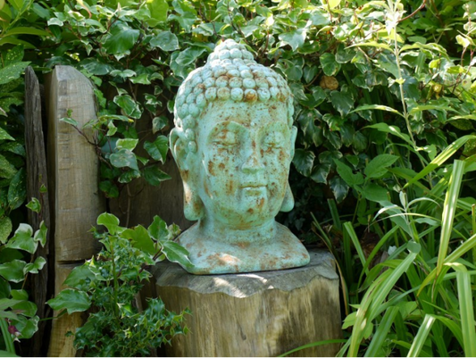 Large green Buddha head for indoor or outdoor