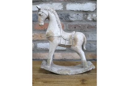 Concrete rocking horse statue inside or outdoor