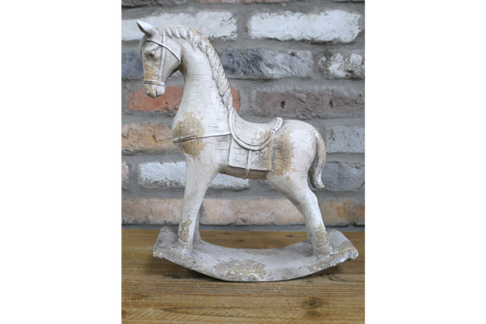 Concrete rocking horse statue inside or outdoor