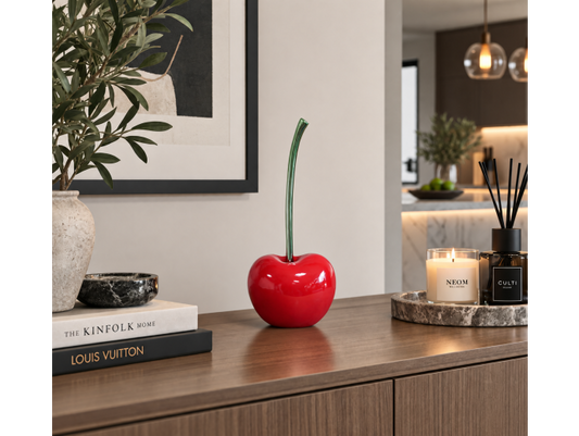 red cherry statue ornament