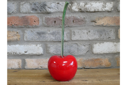 red cherry statue ornament