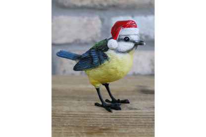 Christmas blue bird statue with Santa hat