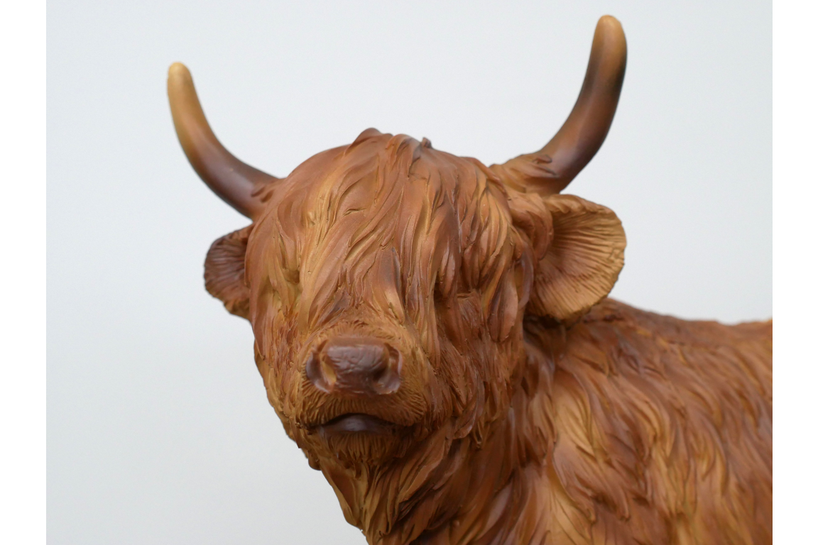 Standing highland cow statue