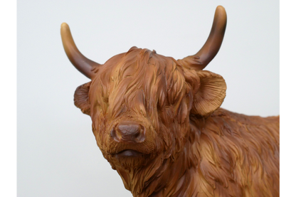 Standing highland cow statue