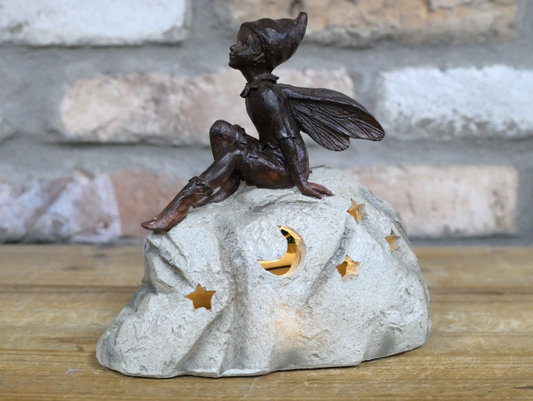 Light up fairy sitting on a stone Solar