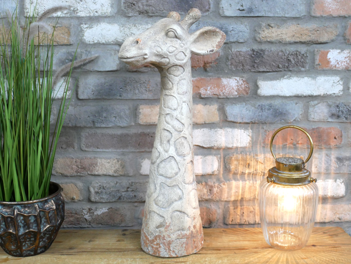 Large concrete giraffe statue indoor or outdoor