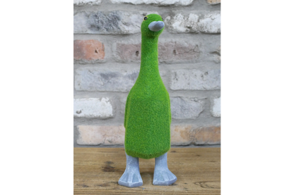 Faux grass duck statue for indoor or outdoor