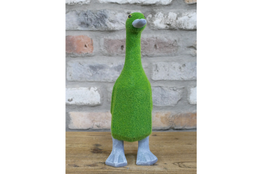 Faux grass duck statue for indoor or outdoor