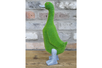 Faux grass duck statue for indoor or outdoor
