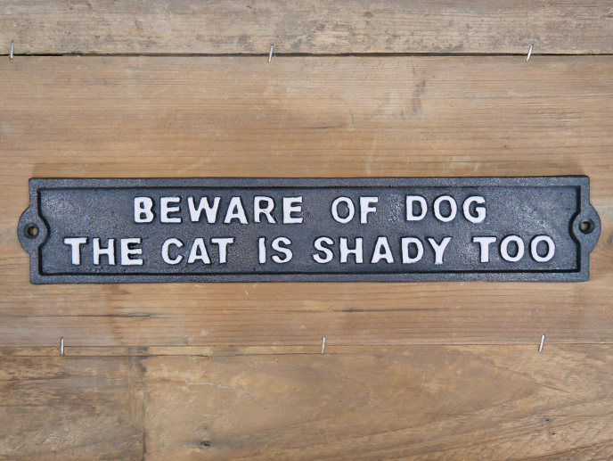 “Beware of the dog the cat is shady too” cast iron metal sign