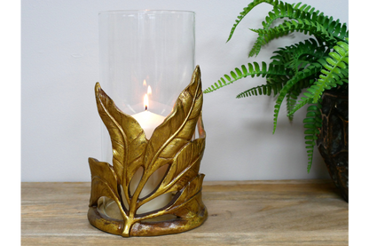 Gold leaf design candle holder with glass . Home decor