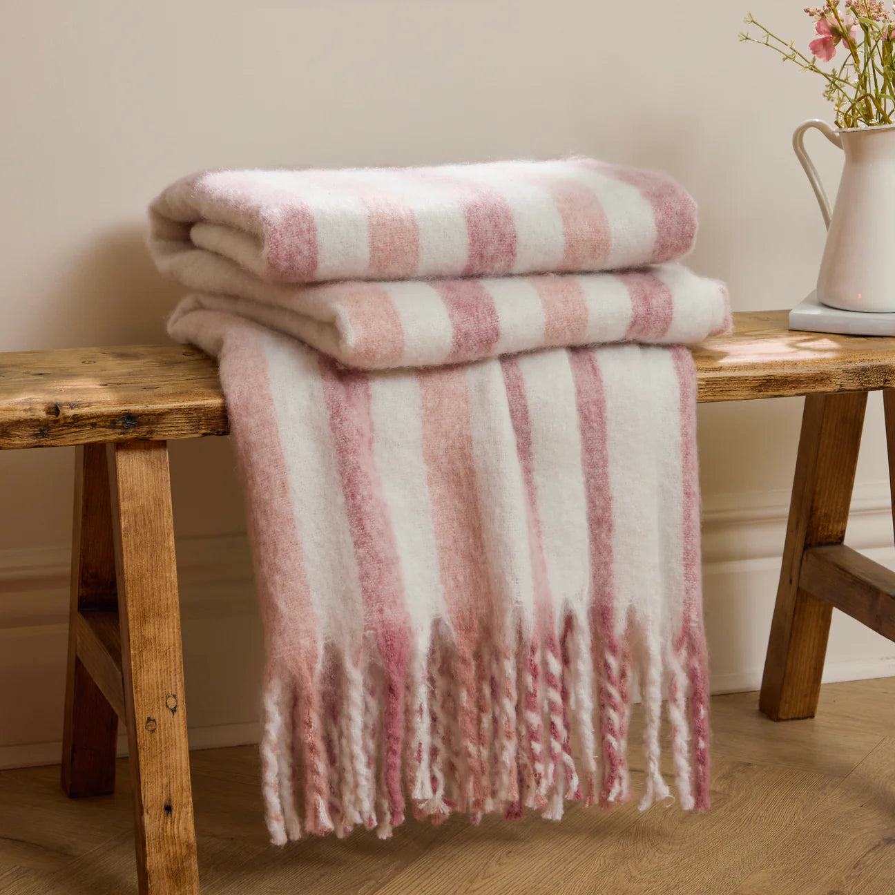 Soft woven pink stripe throw with tassels 140 x 180cm