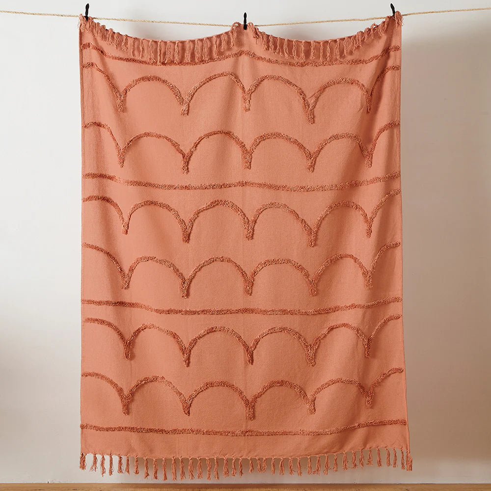 Textured throw in blush with Tassle detail