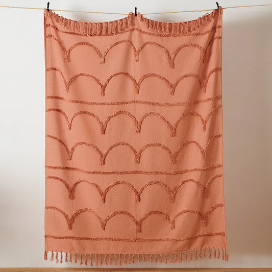 Textured throw in blush with Tassle detail
