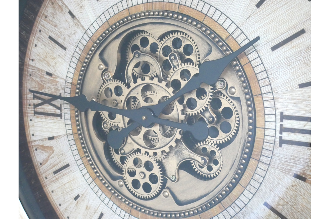 Large cream wall clock with moving brass cog detail