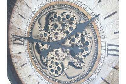 Large cream wall clock with moving brass cog detail